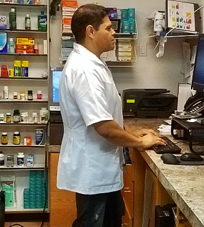 pharmacist working with a computer