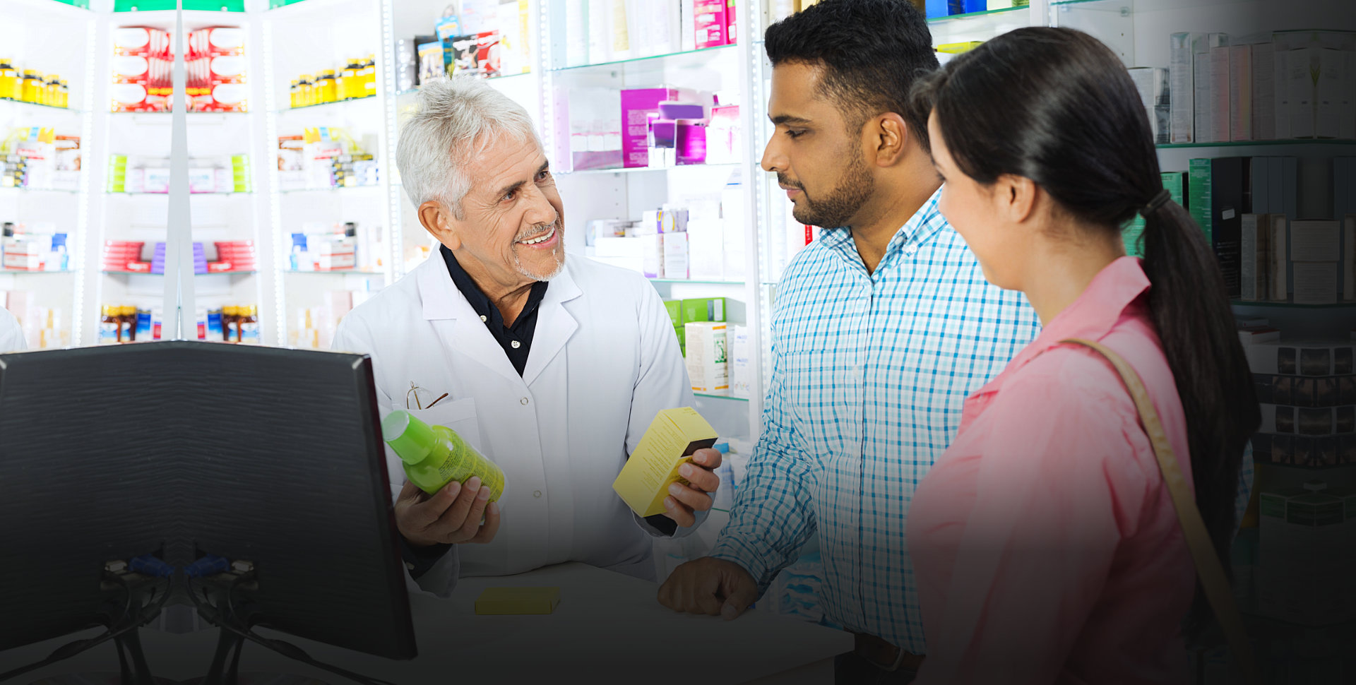 pharmacist talking to customers